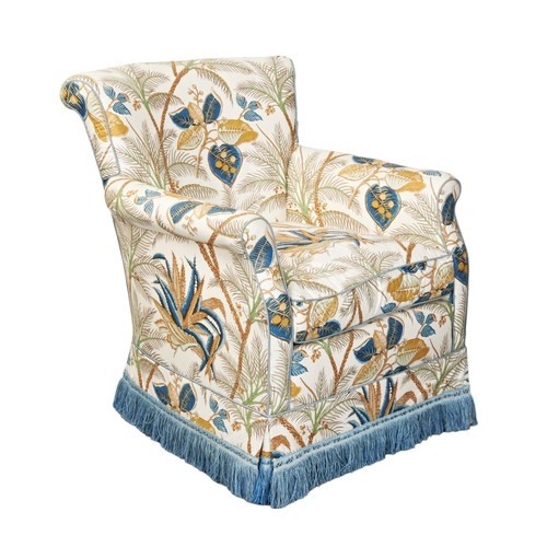 497 - A PETITE UPHOLSTERED ARMCHAIR, 20TH CENTURY covered in a gold and teal foliate print fabric with blu... 