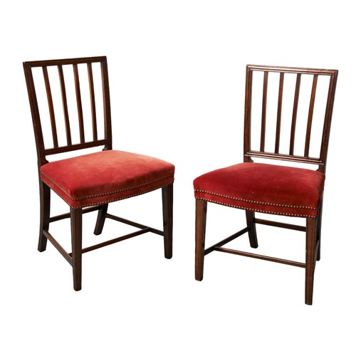 520 - A PAIR OF MAHOGANY STICK BACK CHAIRSThe red velvet covered seat panels raised on tapering square cha... 