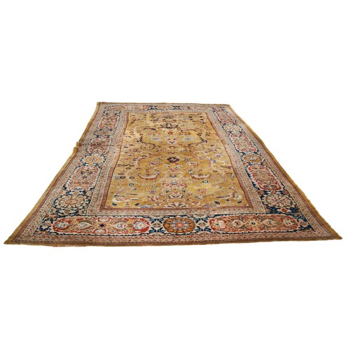 613 - A SUPERB ZIEGLER CARPET, deep border pattern, floral and scroll foliate medallion centre, on a rich ... 