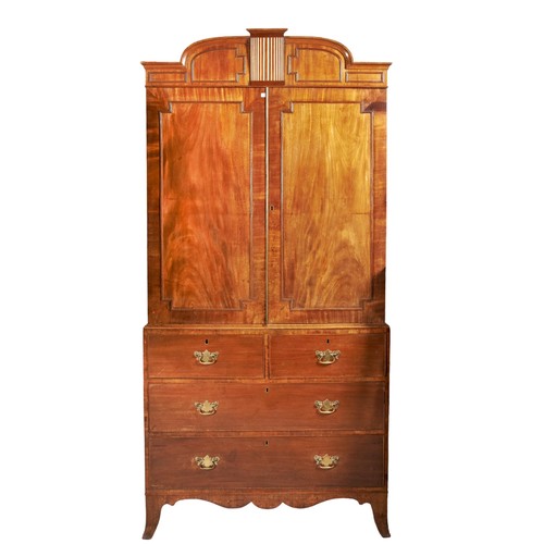 528 - A 19TH CENTURY MAHOGANY LINEN PRESS, two panelled doors over an arrangement of two short and two lon... 