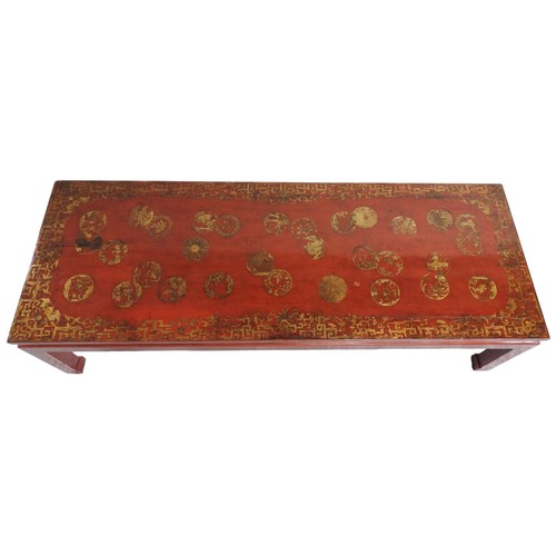 530 - A FRENCH CHINOISERIE COFFEE TABLE, 20TH CENTURY the rich vermillion lacquer decorated with gilt pain... 