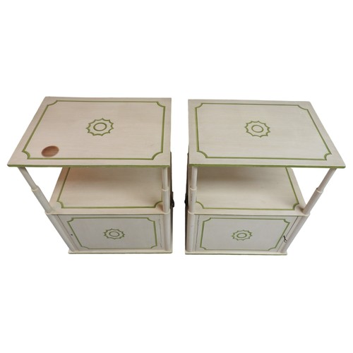 542 - A PAIR OF MATCHING BEDSIDE TABLES, 20TH CENTURY cream painted with lime green stencilled detailing. ... 