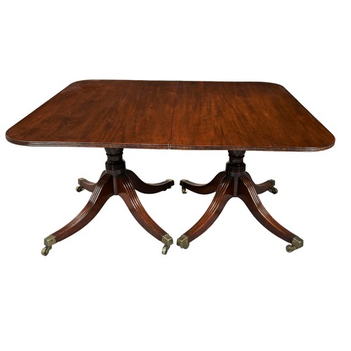 546 - A GEORGE III MAHOGANY TRIPLE PEDESTAL DINING TABLE, the table constructed from two tilting end secti... 