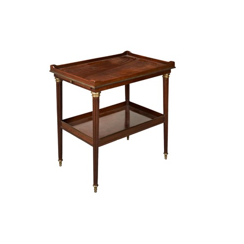 552 - A MAHOGANY TRAY TOP TWO TIER TABLE, 20TH CENTURY the rectangular galleried top with twin pull out su... 