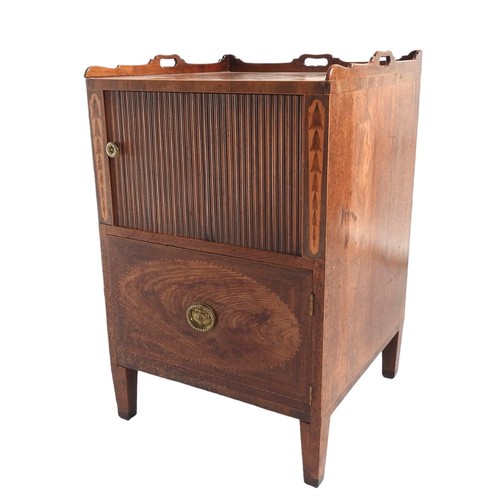 556 - A MAHOGANY NIGHT COMMODE, 19TH CENTURY the three quarter galleried tray top above a tambour roll doo... 