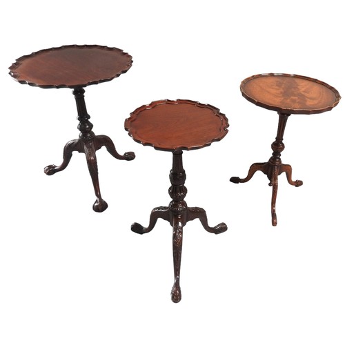 557 - A MIXED GROUP OF THREE VINTAGE WINE TABLES, 20TH CENTURY each with circular pie crust edge tops rais... 