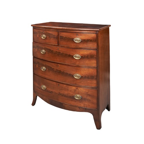 569 - A MAHOGANY BOW FRONT CHEST OF DRAWERS two short drawers over three long graduated drawers raised on ... 