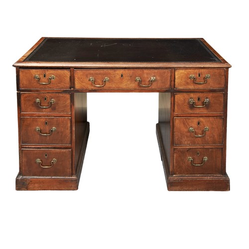 575 - 19TH CENTURY MAHOGANY WRITING DESK gilt tooled leather writing surface above a central frieze drawer... 