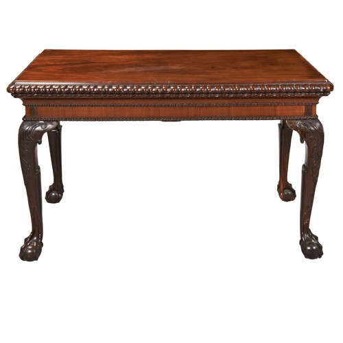 579 - A MAHOGANY CONSOLE TABLE, 19TH CENTURY rectangular top with moulded gadrooned edge raised on four ac... 