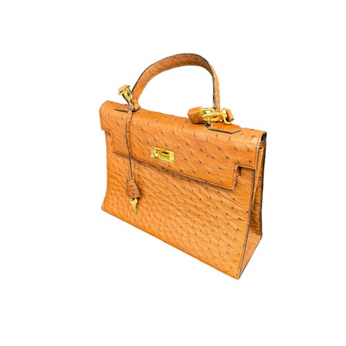 787 - BALENCIAGA TAN OSTRICH SKIN HANDBAG Two small pockets (one with zip) within main compartment. With p... 