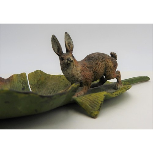 414 - A COLD PAINTED FIGURE OF HARE ON LEAF