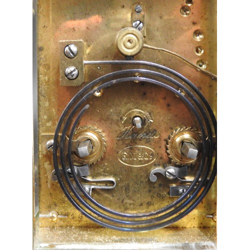 199 - A FRENCH BRASS CASED REPEATING CARRIAGE CLOCK, the brass dial mask inscribed Mallet & Son, Paris... 