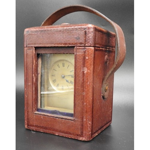 199 - A FRENCH BRASS CASED REPEATING CARRIAGE CLOCK, the brass dial mask inscribed Mallet & Son, Paris... 