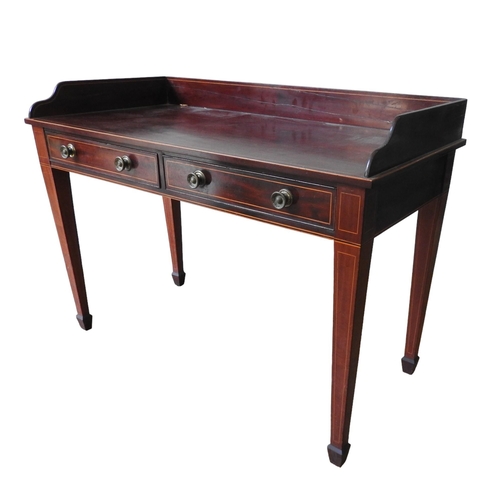 25 - A MAHOGANY TWO DRAWER WASH STAND, rectangular top with three quarter gallery over two short frieze d... 