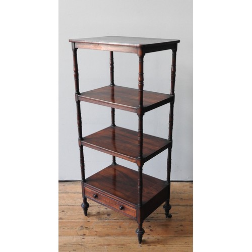 11 - A VICTORIAN ROSEWOOD WHATNOT, the four tiers united by turned pillar supports, the bottom tier with ... 