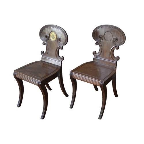 51 - A PAIR OF 19TH CENTURY MAHOGANY HALL CHAIRS, IN THE MANNER OF GILLOWS, elegant arch top scrolling ba... 