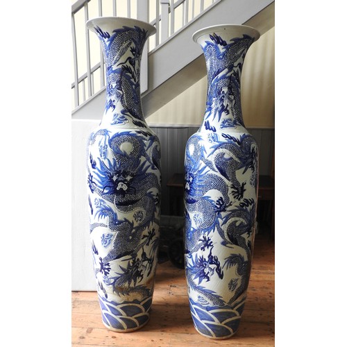 343 - A PAIR OF MONUMENTAL CHINESE VASES, 20TH CENTURY, the baluster form vases decorated with scaly drago... 