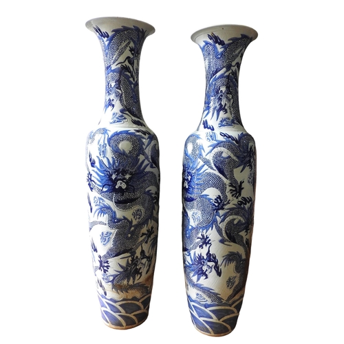 343 - A PAIR OF MONUMENTAL CHINESE VASES, 20TH CENTURY, the baluster form vases decorated with scaly drago... 