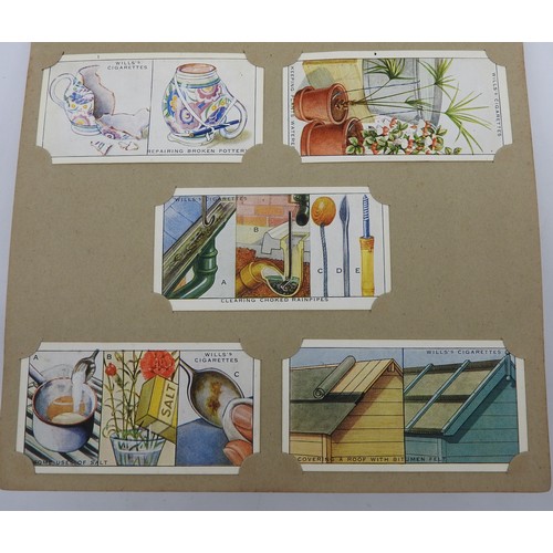 422 - TWO VINTAGE WILL'S CIGARETTE CARD ALBUMS, one filled with the 'Household Hints' series, the other wi... 