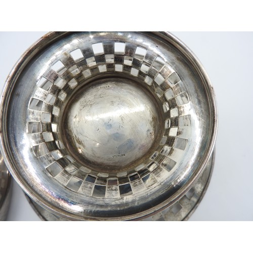 453 - TWO BIRKS SILVER BOWLS, the lot includes a beaded edge pierced checkerboard bowl raised on a circula... 