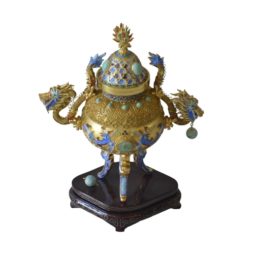 224 - AN ORNATE CHINESE GILT METAL INCENSE BURNER, cloisonne decorated sides and legs, flanked by twin dra... 