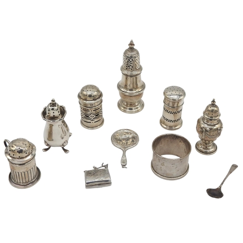 448 - SIX VARIOUS VINTAGE SILVER PEPPERETTES, along with a napkin ring, stamp purse and miniature hand mir... 