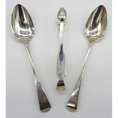 438 - TWO GEORGIAN SILVER SERVING SPOONS AND A PAIR OF IRISH SILVER SUGAR TONGS, the spoons marked London ... 