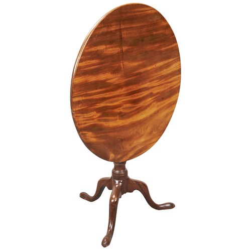 57 - A MAHOGANY TRIPOD TABLE, 19TH CENTURY, the circular tilting top on a turned tapering column with flu... 