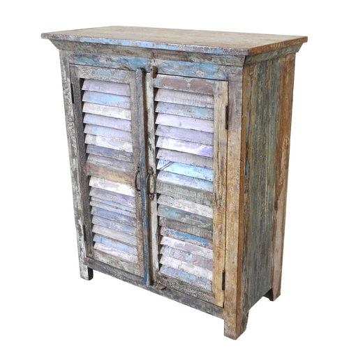 112 - AN ATTRACTIVE DISTRESSED INDIAN HARDWOOD CUPBOARD, with polychrome chalk paint decoration, the two l... 
