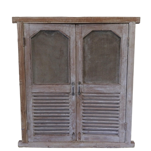 109 - A PAIR OF INDIAN LIMED HARDWOOD LOUVRE SHUTTER DOORS, with mesh inset panels142 x 130 cmProvenance: ... 