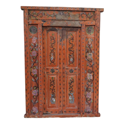 107 - AN INDIAN HARDWOOD PAIR OF SHUTTER DOORS, decorated with scrolling flowering stems, birds and fishes... 
