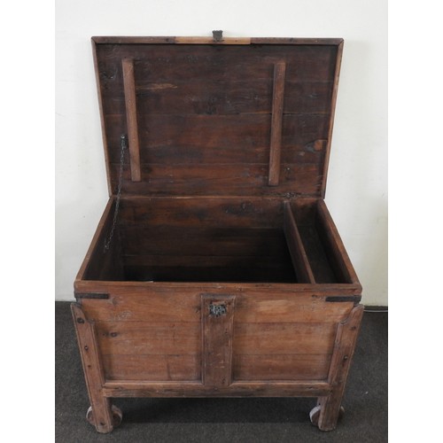 100 - AN INDIAN TEAK COFFER WITH CASTERS, mounted with iron brackets and fixtures73 x 88 x 60 cmProvenance... 