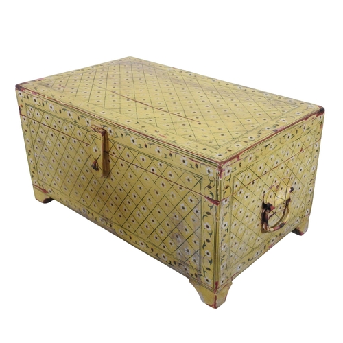 85 - A YELLOW PAINTED INDIAN HARDWOOD TRUNK, with lozenge and flower head decoration28 x 55 x 32 cmProven... 
