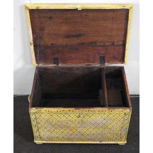82 - AN INDIAN HARDWOOD TRUNK, painted in a vibrant yellow with a floral lozenge pattern38 x 60 x 40 cmPr... 