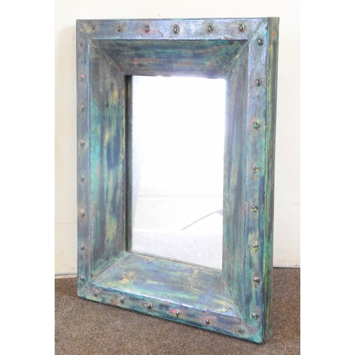 77 - A GREEN PAINTED TIN FRAMED WALL MIRROR, with distressed patina64 x 50 cmProvenance: Property of a lo... 