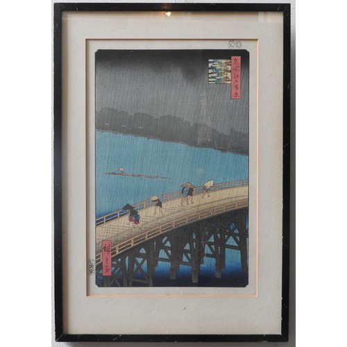 348 - UTAGAWA HIROSHIGE (1797-1858) 'SUDDEN SHOWER AT OHASHI BRIDGE' WOODCUT/PRINT, glazed and framed 36 x... 