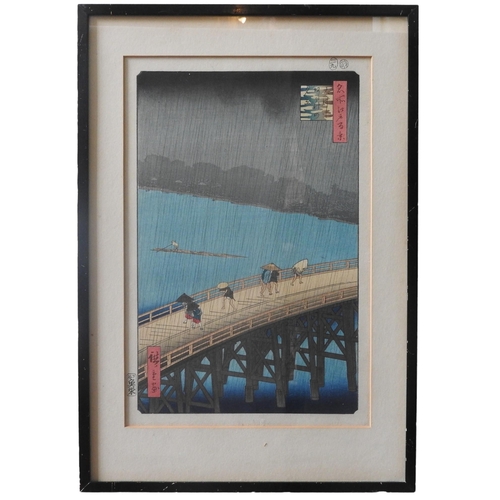 348 - UTAGAWA HIROSHIGE (1797-1858) 'SUDDEN SHOWER AT OHASHI BRIDGE' WOODCUT/PRINT, glazed and framed 36 x... 