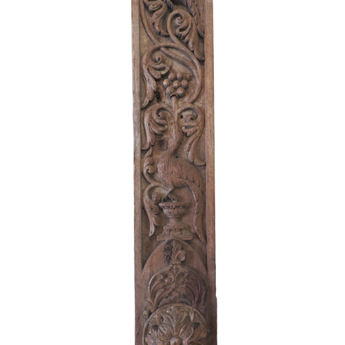 70 - AN ORNATELY CARVED INDIAN HARDWOOD FRIEZE PANEL, with depcitions of birds amongst scrolling fruiting... 