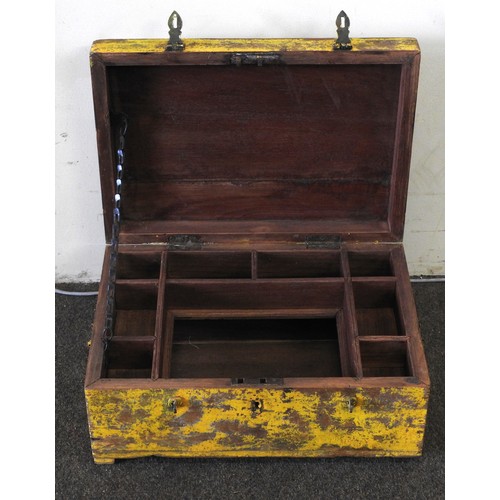 65 - AN INDIAN TEAK WRITING BOX, painted in a vibrant yellow with an attractive distrssed finish, the hin... 