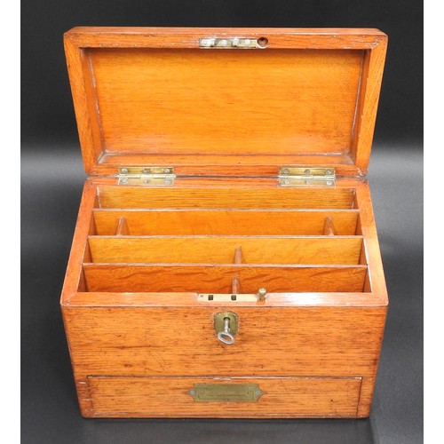 431 - AN OAK FITTED STATIONARY BOX AND A MAHOGANY TEA CADDY, the stationery box with a drawer mounted with... 