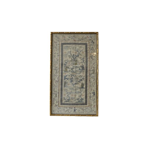 227 - A CHINESE SILK EMBROIDERED SLEEVE, LATE QING DYNASTY, mounted in a simulated bamboo frame66 x 37 cm... 