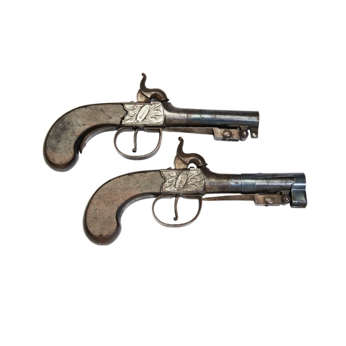 172 - A PAIR OF PERCUSSION PISTOLS WITH SPRING LOADED BAYONETS  BY REED, LONDON, the sliding    trigger gu... 