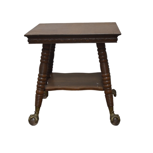 19 - AN AMERICAN OAK CENTRE TABLE, LATE 19TH CENTURY, the square top with a carved scroll foliate frieze,... 