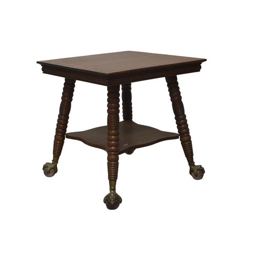 19 - AN AMERICAN OAK CENTRE TABLE, LATE 19TH CENTURY, the square top with a carved scroll foliate frieze,... 