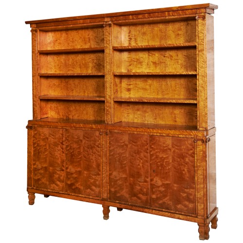 564 - A LARGE MAPLE WOOD BEIDERMEYER LIBRARY BOOKCASE CUPBOARD in two sections. Three tier bookshelves rai... 