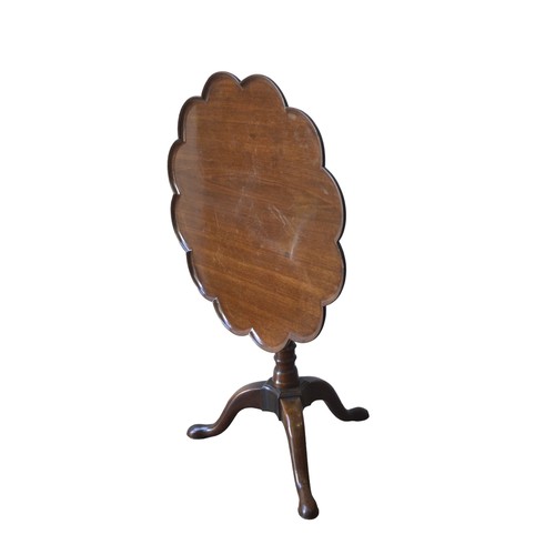 550 - A MAHOGANY TRIPOD TABLE, 19TH CENTURY the tilting circular top with undulating scalloped gallery edg... 