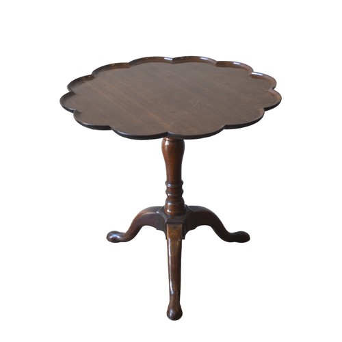 550 - A MAHOGANY TRIPOD TABLE, 19TH CENTURY the tilting circular top with undulating scalloped gallery edg... 