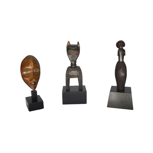 784 - A. TAPPERANGOLA/D.R.C, 20TH CENTURY, 17.5 cm hightogether with a Dan mask and a Baule heddle pulleyP... 