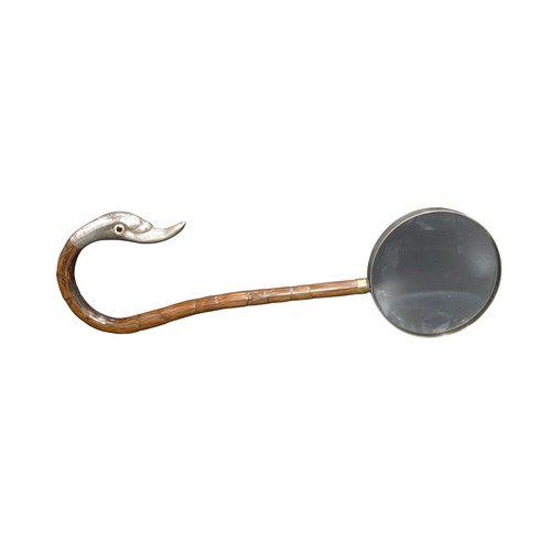 805 - A SILVER MOUNTED PARASOL HANDLE, repurposed as a magnifying glass, the silver mount modelled as a du... 