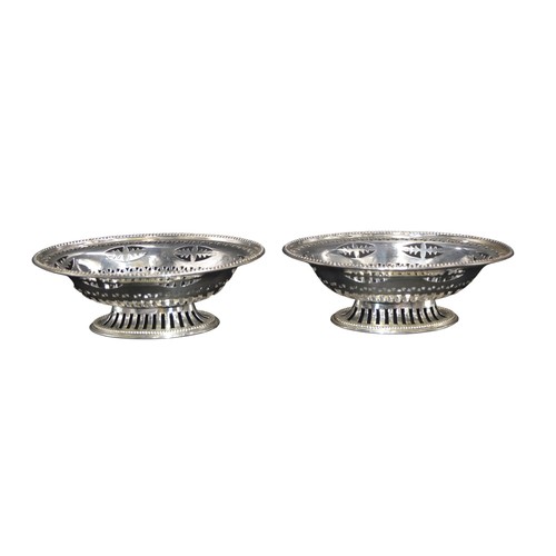 798 - A PAIR OF OVAL SILVER SWEETMEAT DISHES, ornate pierced sides with beaded rims, marked William Neale,... 